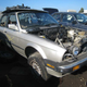 Illustration for article titled Junked BMW E30s Provide Cheap, Easy Way To Trunk-Mount Your Battery